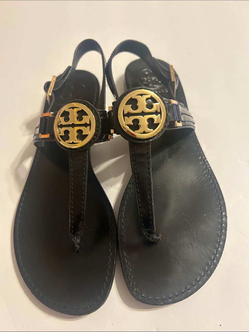 Tory Burch Black Leather Sandals with Gold Logo Medallions
